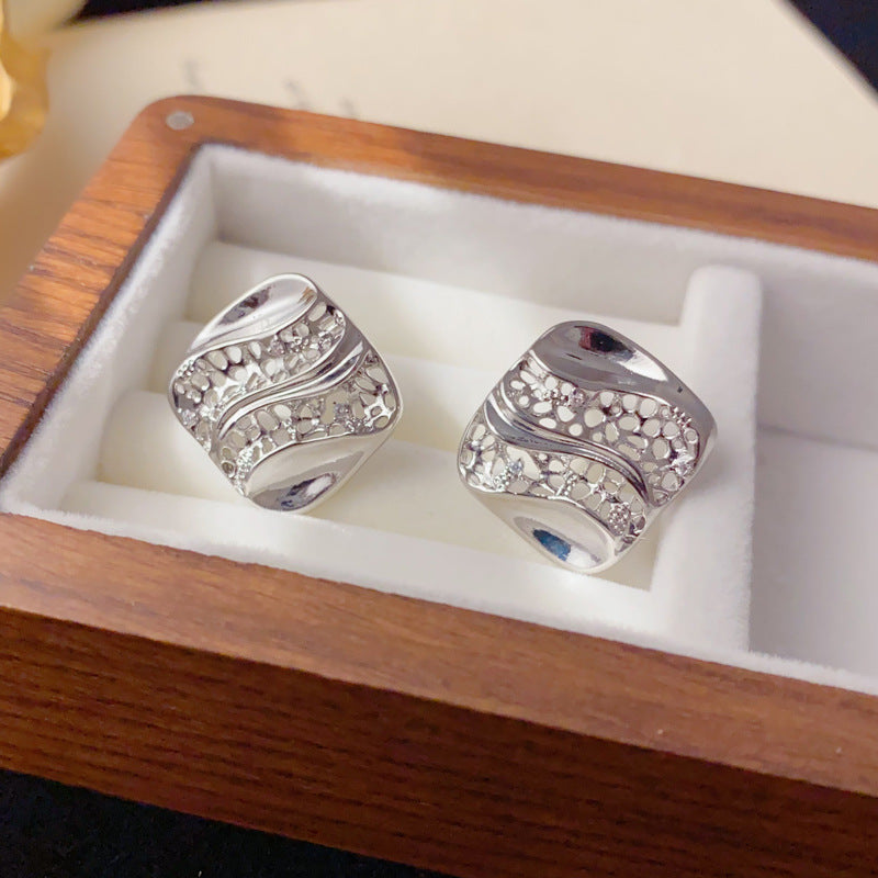 Luxury Hollow Diamond-Shaped Metal Stud Earrings – Geometric Design