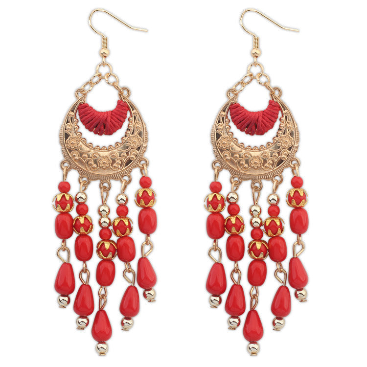 Ethnic style earrings female European and American elegant hand-made water drops tassel earrings Bohemian crescent-shaped earrings