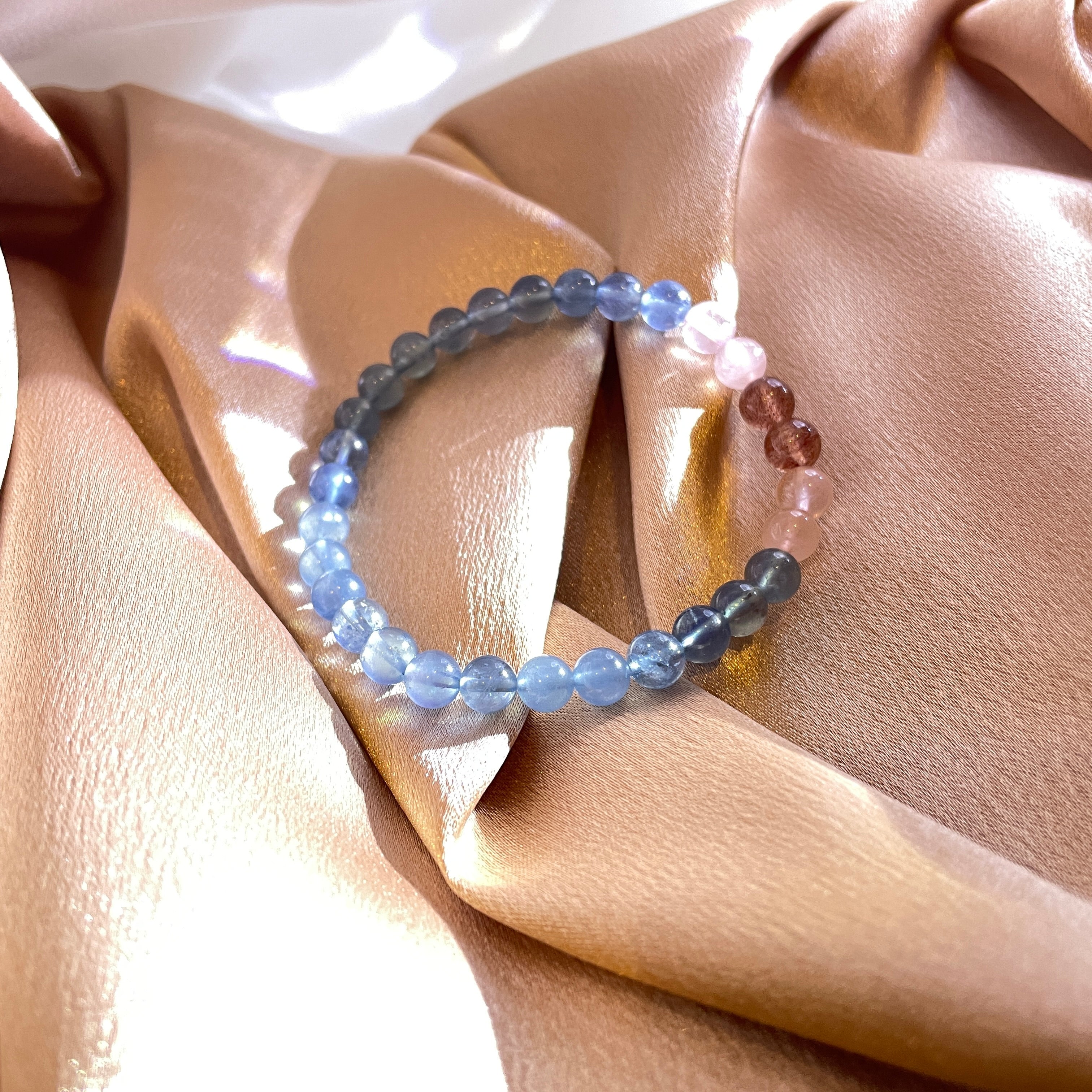 The image showcases a bracelet named "Sweet Pink Bliss," crafted from natural aquamarine, pink crystal, and strawberry crystal. The colors are soft, fresh, emitting a sweet aroma.