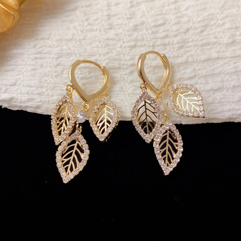 Elegant Zircon Hollow Leaf Tassel Earrings – French Botanical Design