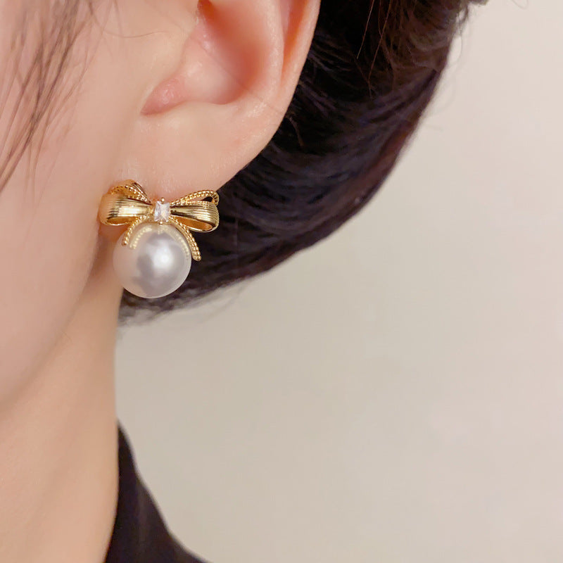 Elegant Metal Bow Pearl Stud Earrings – French Minimalist Design