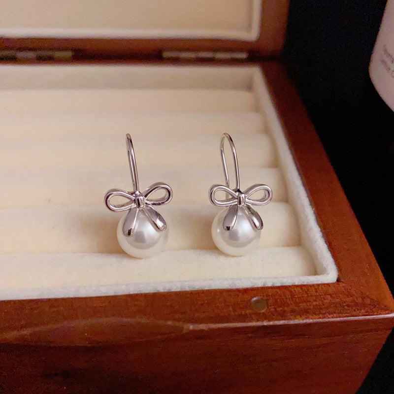 14K Gold Minimalist Metal Bow & Pearl Hook Earrings – Elegant Design