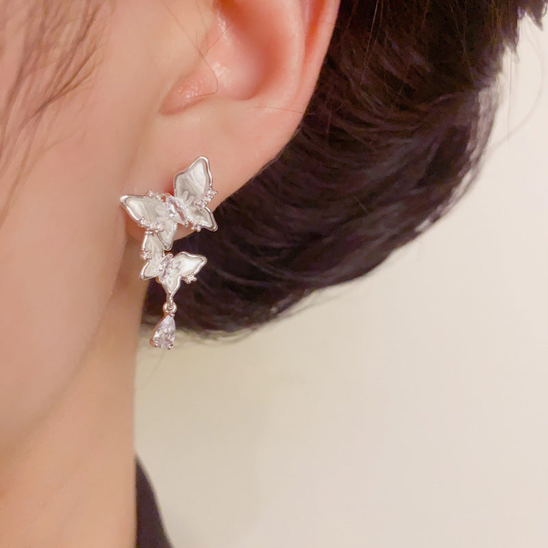 Silver French-Style Zircon Butterfly Tassel Earrings – Elegant Design