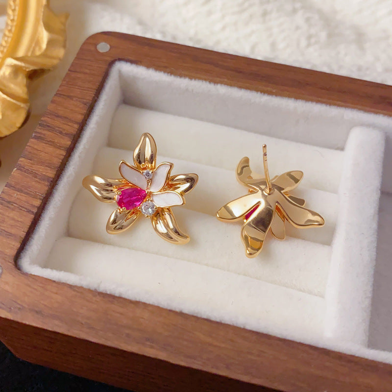Elegant Zircon Hollow Petal Stud Earrings – Floral Design