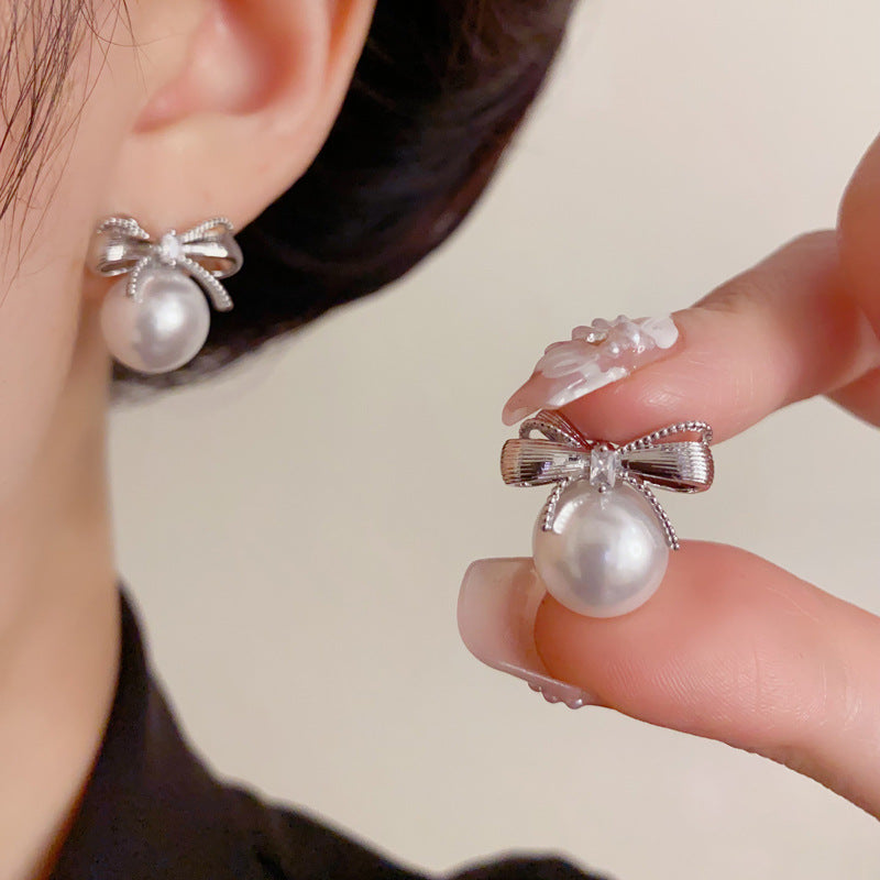 Elegant Metal Bow Pearl Stud Earrings – French Minimalist Design