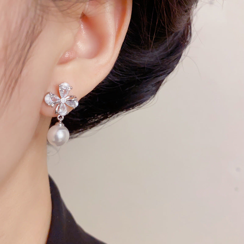 Elegant Four-Leaf Flower Pearl Drop Earrings – Gentle Floral Design