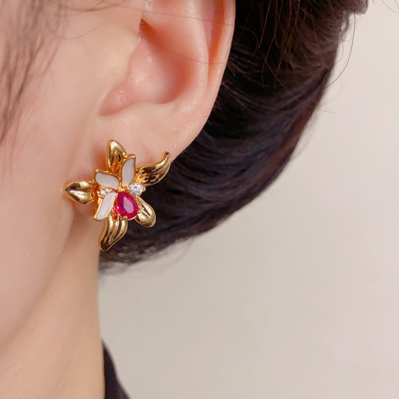 Elegant Zircon Hollow Petal Stud Earrings – Floral Design