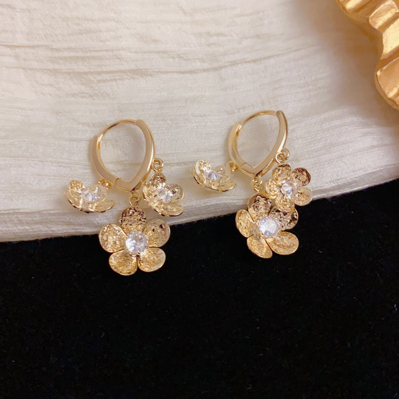 Luxury Metal Petal Tassel Earrings – Elegant Floral Design