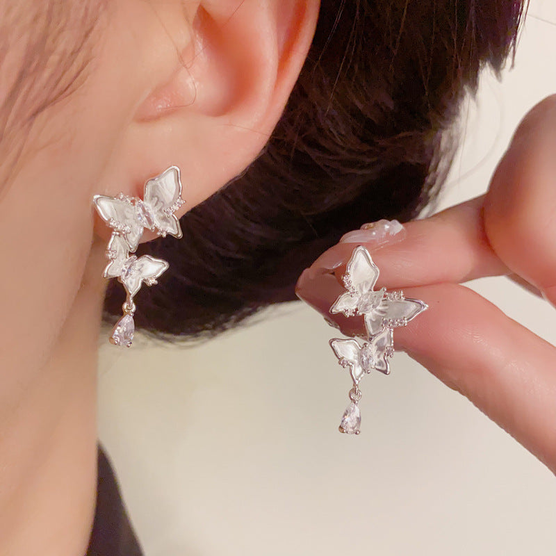 Silver French-Style Zircon Butterfly Tassel Earrings – Elegant Design