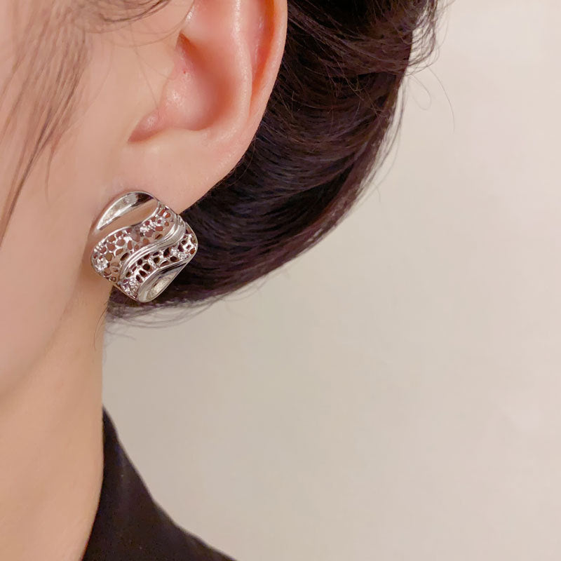 Luxury Hollow Diamond-Shaped Metal Stud Earrings – Geometric Design
