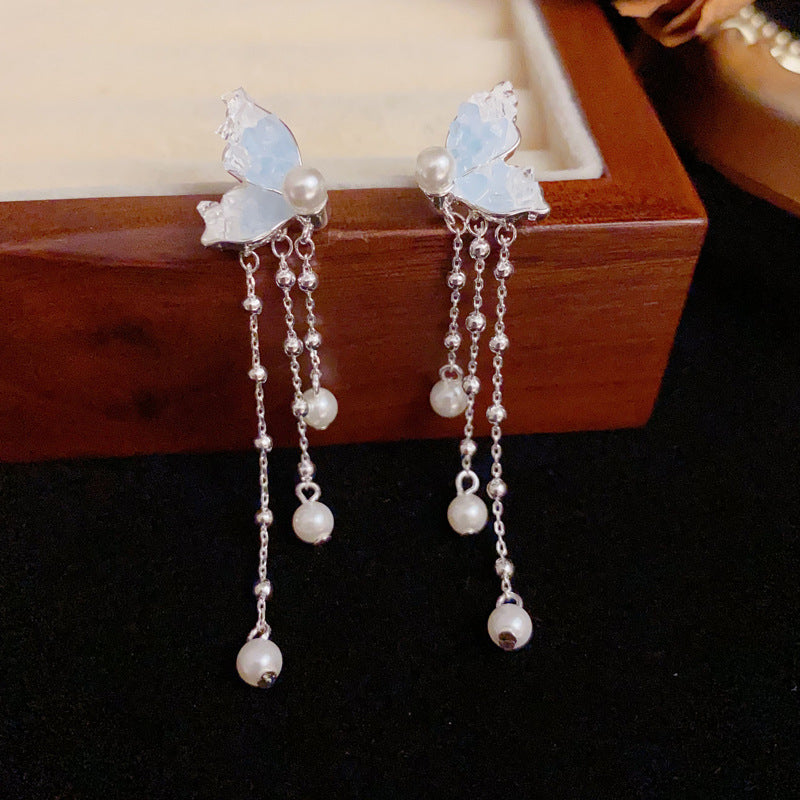 Blue Crystal Butterfly & Pearl Tassel Drop Earrings – Elegant Design