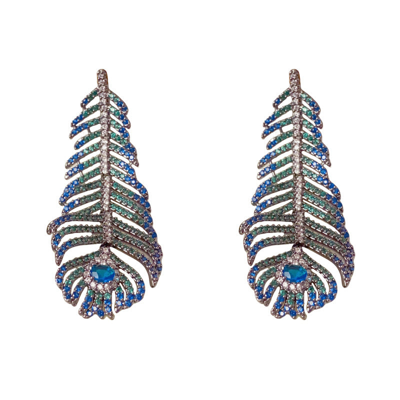 Elegant Peacock Feather Tassel Drop Earrings – Boho Dangle Design
