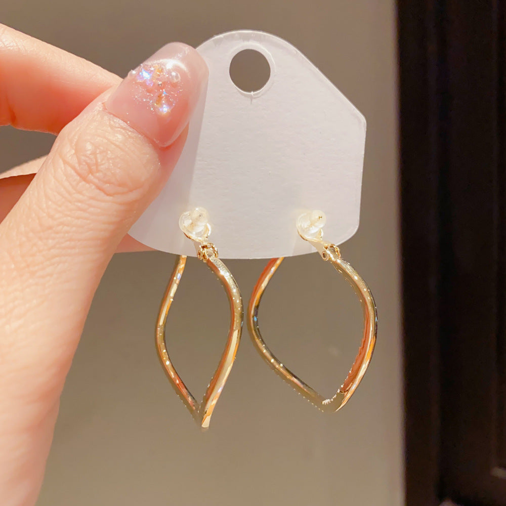 Eaioncol Full CZ Irregular Hoop Earrings Gold