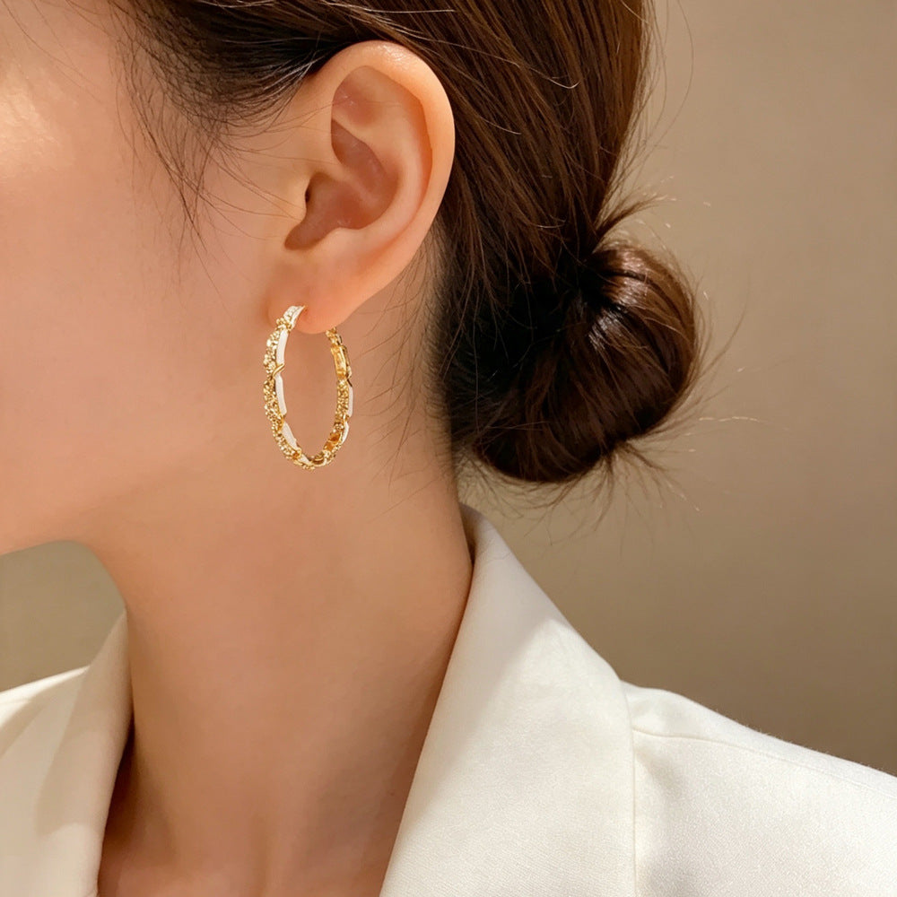 Eaioncol Spliced Twisted Hoop Earrings Gold
