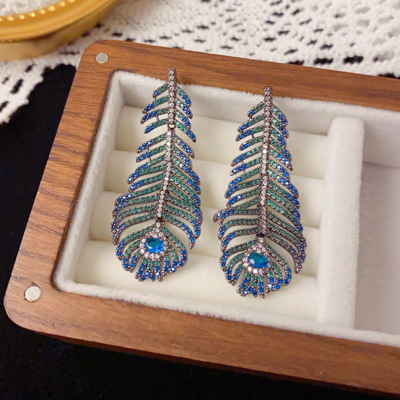 Elegant Peacock Feather Tassel Drop Earrings – Boho Dangle Design