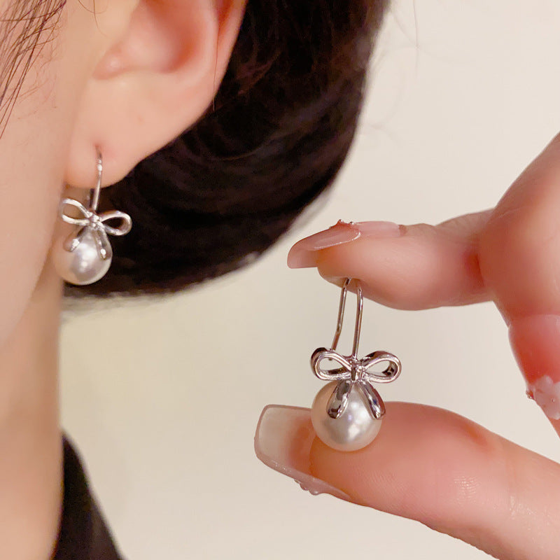 14K Gold Minimalist Metal Bow & Pearl Hook Earrings – Elegant Design