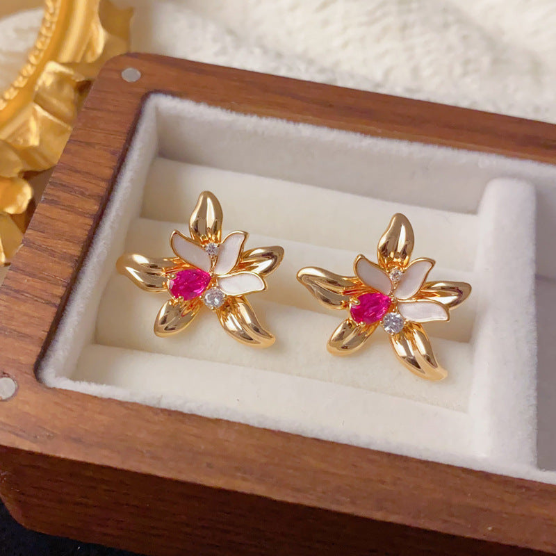 Elegant Zircon Hollow Petal Stud Earrings – Floral Design