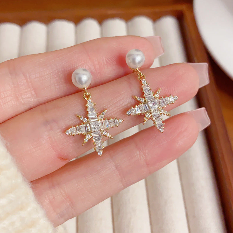 Elegant Zircon Starburst Pearl Drop Earrings – Celestial Design