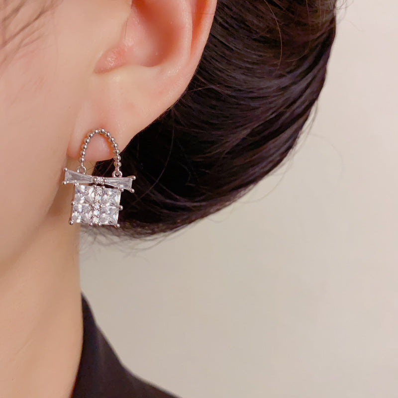 Luxury Full-Zircon Bow Handbag Drop Earrings – Geometric Design
