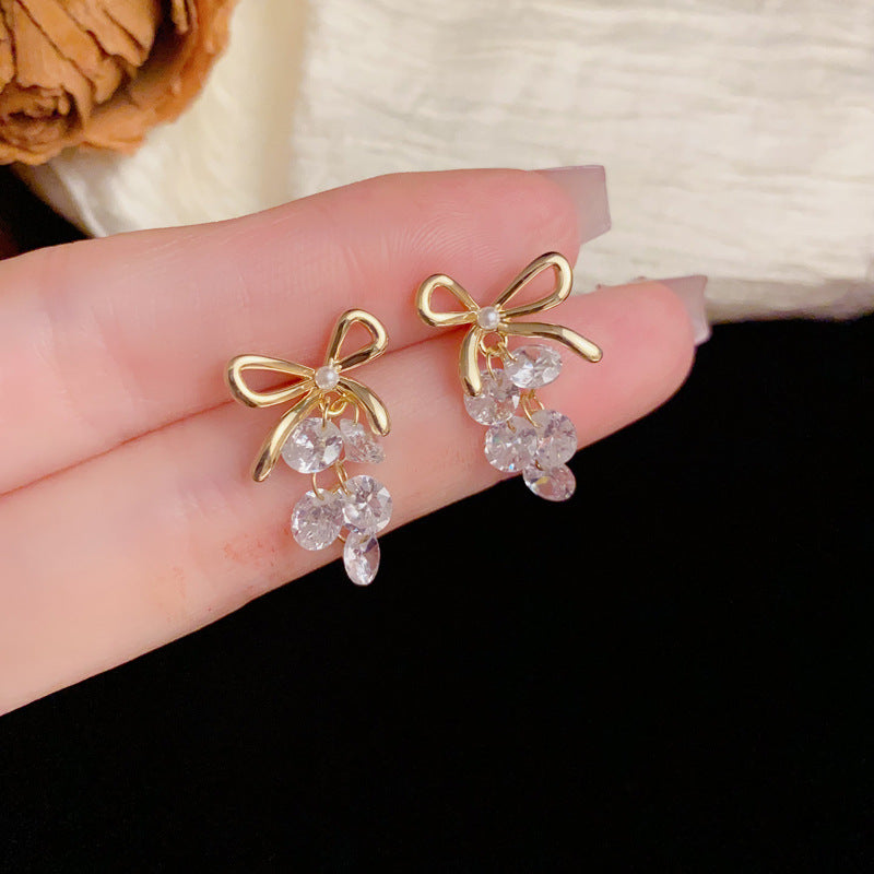 Luxury Metal Bow & Crystal Grape Drop Earrings – Elegant Design