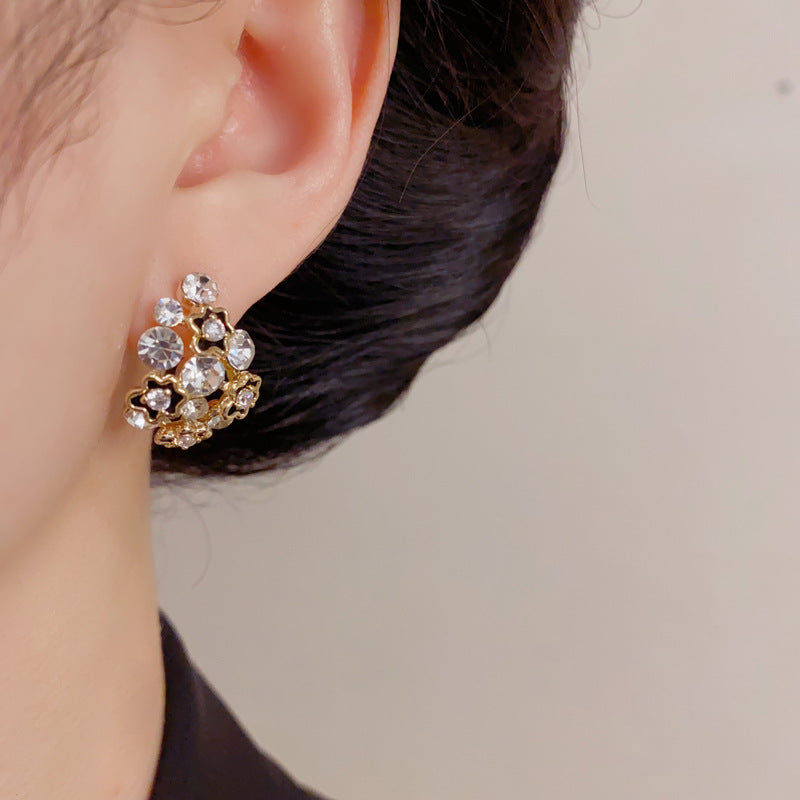 Eaioncol Cutout Floral C Hoop Earrings Black & White