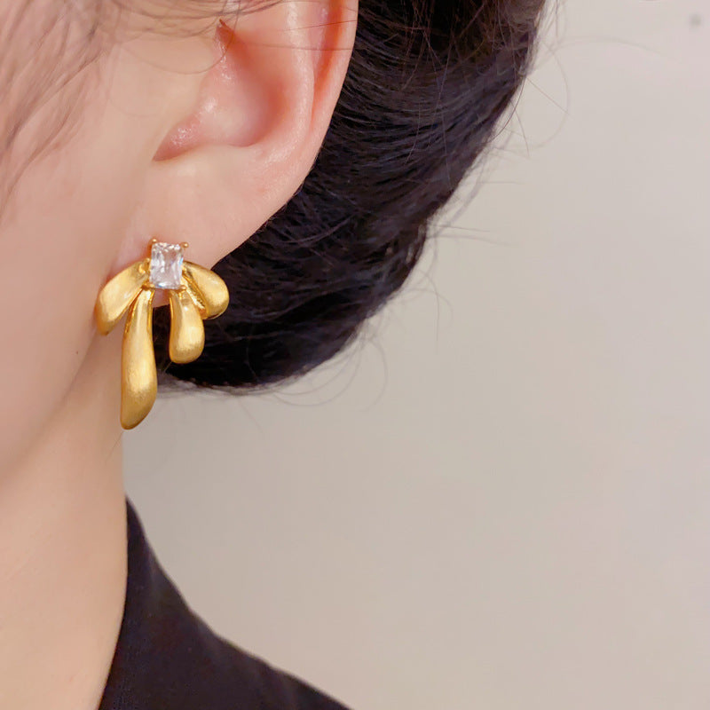 Eaioncol Brushed Metal Bow Stud Earrings Gold Silver