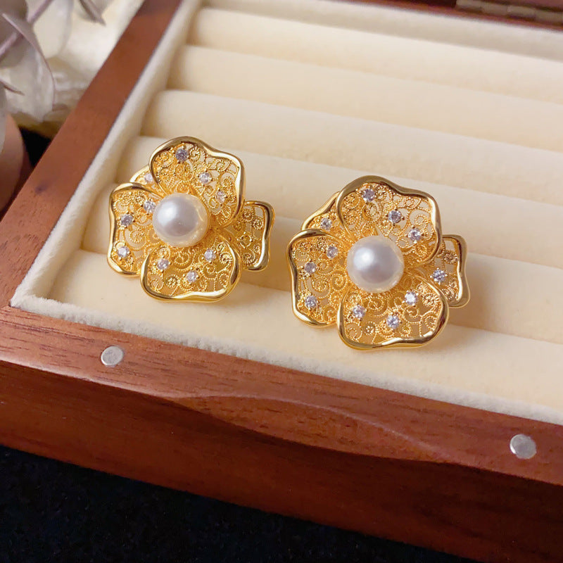 Elegant Hollow Metal Pearl Petal Stud Earrings – Floral Design