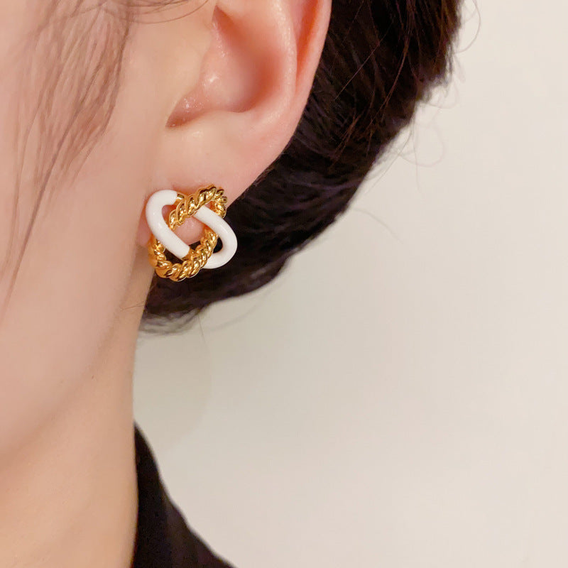 Elegant Drip-Oil Twisted Cross Metal Stud Earrings – Minimalist Design